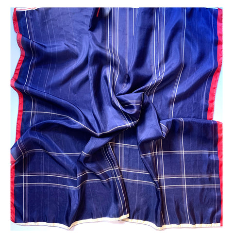 Blue Untitled Silk Scarf designed by NYC designer Tehniyet Masood in 2020. Chic gift for those who have it all. 36 inches by 36 inches, 100% Silk $120Luxurious Square Silk Scarf with Blue & Orange Stripe design 36"X36". 100% Habotai Silk 8mm Unisex.  Imported